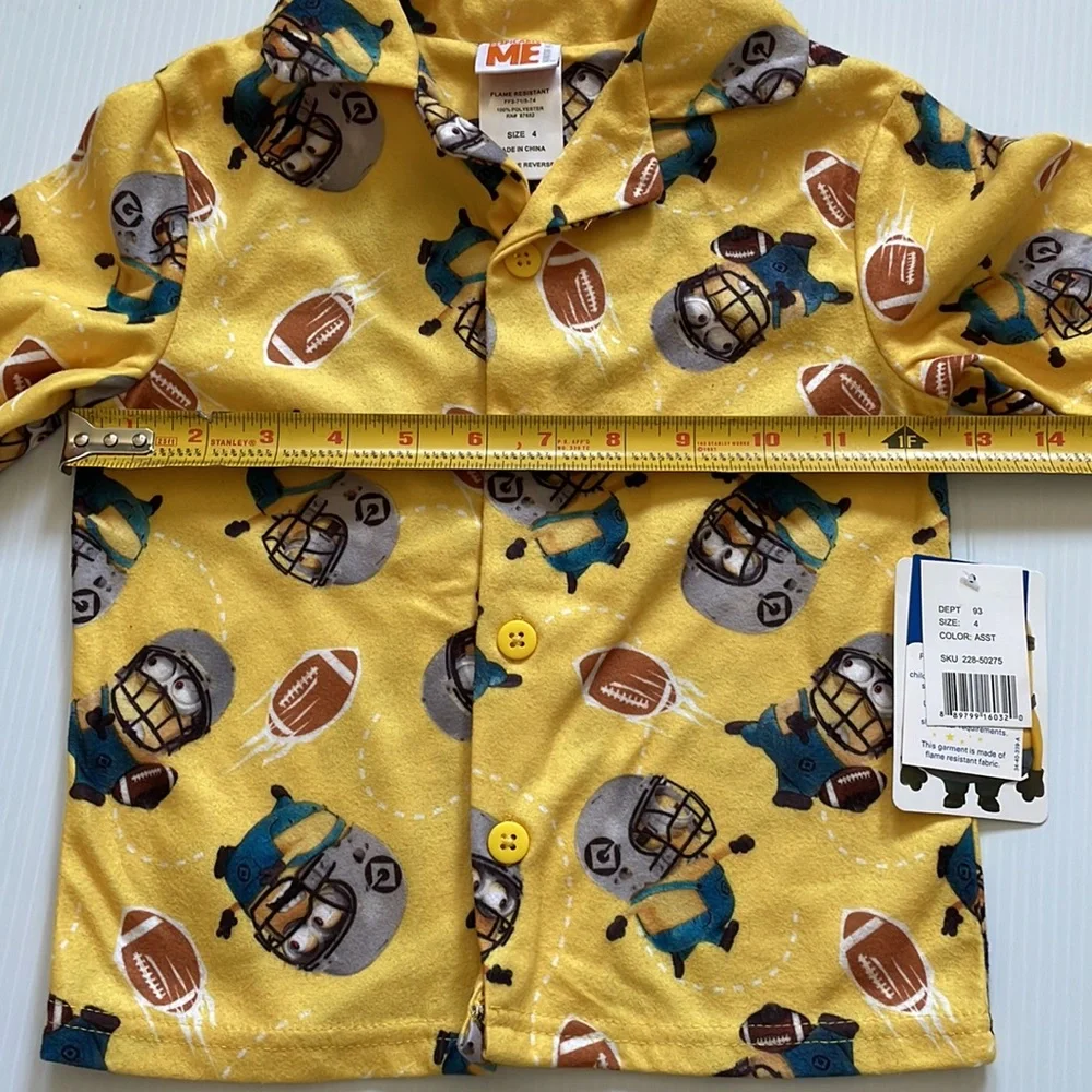 Minions yellow football pajama top & bottoms.  Size 4